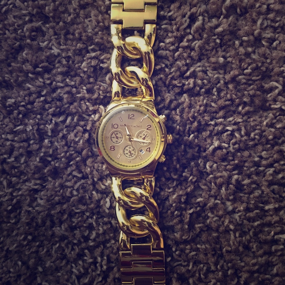 Michael kors gold watch. Brand new never worn.